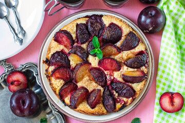 Sweet plum cake with cinnamon served with mint