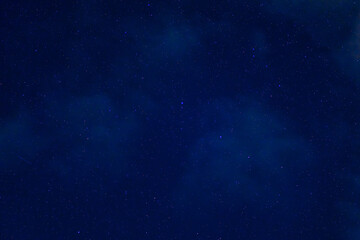 Obraz na płótnie Canvas Stars on background of the night starry sky. Milky Way, galaxies and universes on a dark blue background