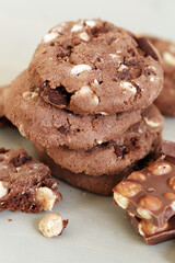 Delicious cookies with chocolate lay on a table