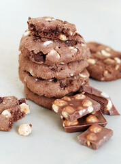Delicious cookies with chocolate lay on a table