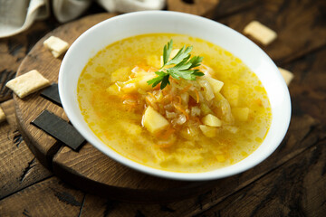 Traditional homemade sauerkraut soup with fresh parsley