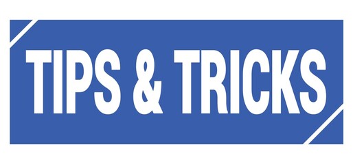 TIPS & TRICKS text written on blue stamp sign.
