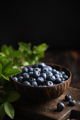 Fresh Blueberries with leaves, selective focus