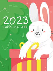 The design of the New Year's vertical greeting card 2023 rabbit. A card with a cute white rabbit in cartoon style with a Christmas tree and a gift and the text happy new year.