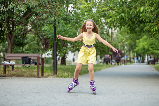 Child rollerblading fast at skate park. Having fun. Concept of an active lifestyle, hobbies