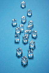 Ice cubes on blue