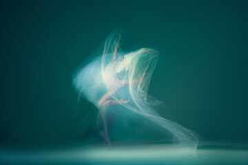 Light weightless gait of ballerina similar to smooth movement of a cloud. Art, beauty, aspiration,...
