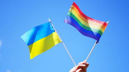 Ukraine and rainbow flags. Pride parade. Support gender rights. LGBT demonstration