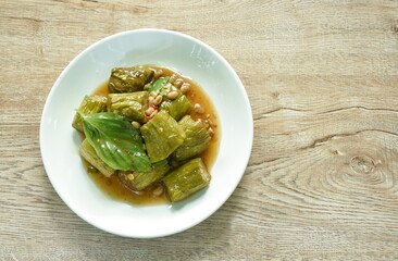 stir fried slice long green eggplant with chop pork and egg on plate