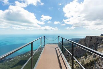 Obraz premium View of the mountains, the sea and the clear sky from the bridge.