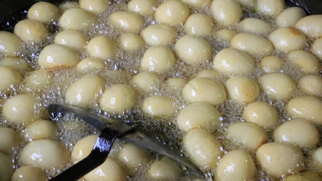 High-angle view of Traditional Sweet Rosogulla making in Bangladesh