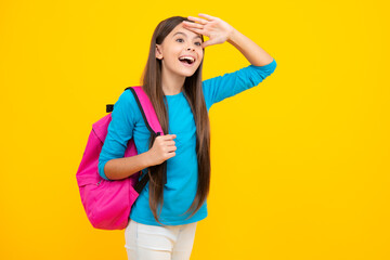 School teen girl in with backpack. Teenager student on isolated background. Kids learning, education, studying and knowledge. Excited teenager, glad amazed and overjoyed emotions.