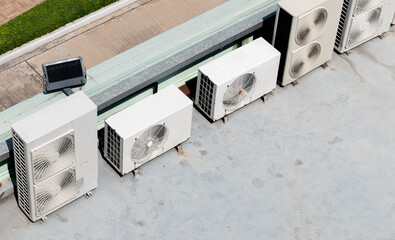 Air compressor on rooftop building