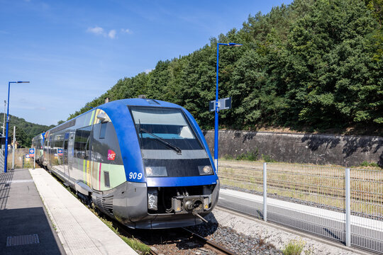 Wingen sur Moder, France - August 08, 2022 : Stopping of a TER, french Train Express Regional (Sncf) in a station on the railway Sarrebruck-Strasbourg in the Alsace Region