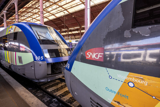 Strasbourg, France - August 08, 2022 : Stopping of a TER, french Train Express Regional (Sncf) in a station on the railway Sarrebruck-Strasbourg in the Alsace Region