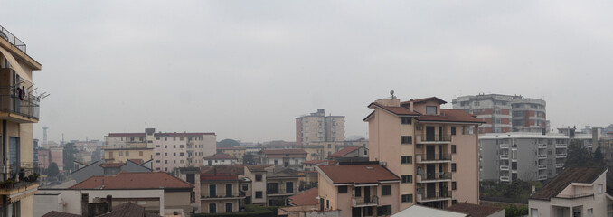 panoramica city skyline with clouds in bad weather of Aversa with fog