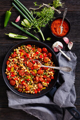 Hoppin John of black-eyed peas, veggies, sausages