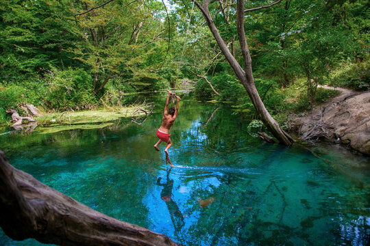 Incredibly beautiful fabulous place in Azerbaijan Nabran region river with incredible pure crystal water icy people jumping from a rope