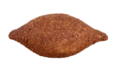 Kibe. Traditional Brazilian snack food. Isolated on defocused fire in the background. Copy space.