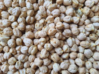 Chickpeas (Cicer arietinum), full frame, backgrounds and textures. It is also known by the names: Gravanço, Herbanzo, Chicken Pea or Bengal Pea or Duck Grain.