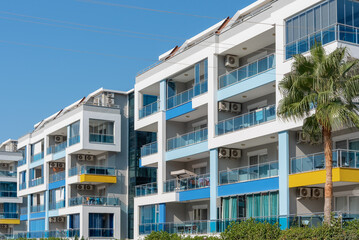 Cityscape of a residential area with modern apartment buildings.