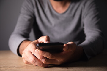 Man using mobile smartphone.