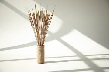 reeds in a decorative vase