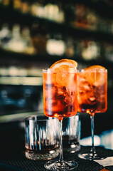 Aperol Spritz Cocktail in glass on bar counter