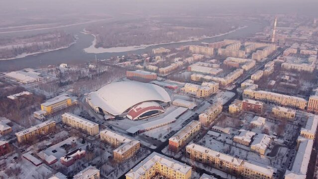 Russia, Krasnoyarsk. 20 November 2021: Sport Stadium Enisey. Home bandy arena Enisey club. Yenisei Ice Stadium, Krasnoyarsk from Drone.
