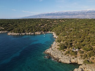 Aerial view of Potocnica, Lun and Novalja in island of Pag, archipelago of Croatia. Panoramic drone view of waterfront, idyllic and turquoise sea in Novalja, Adriatic Sea in Dalmatia region.

