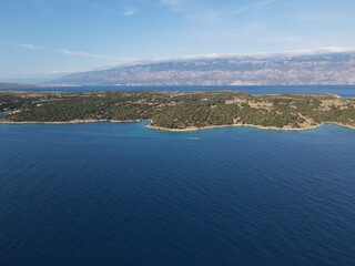 Aerial view of Potocnica, Lun and Novalja in island of Pag, archipelago of Croatia. Panoramic drone view of waterfront, idyllic and turquoise sea in Novalja, Adriatic Sea in Dalmatia region.
