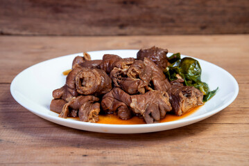 Chinese herbs stewed pork intestines, ready to serve