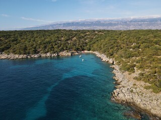 Aerial view of Potocnica, Lun and Novalja in island of Pag, archipelago of Croatia. Panoramic drone view of waterfront, idyllic and turquoise sea in Novalja, Adriatic Sea in Dalmatia region.
