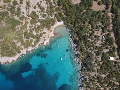 Aerial view of Potocnica, Lun and Novalja in island of Pag, archipelago of Croatia. Panoramic drone view of waterfront, idyllic and turquoise sea in Novalja, Adriatic Sea in Dalmatia region.
