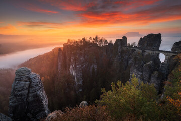 Sunrise over sandstone bridge in Bastei, Saxon Switzerland, Germany