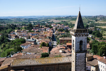 Fototapeta na wymiar Firenze, Tuscany, Italy 08-26-2022. Vinci village, Leonardo birthplace, aerial view and bell tower of the church.