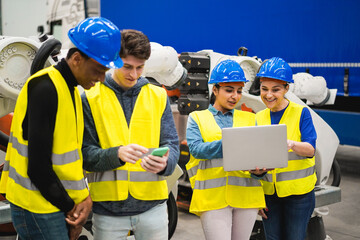 Multiracial engineers working inside robotic factory - Focus on senior woman face