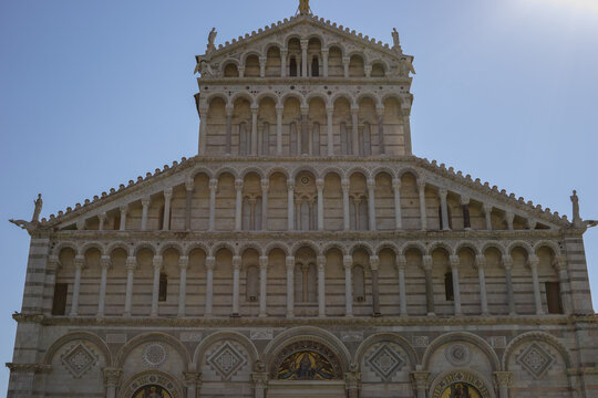 Pisa, Tuscany, Italy 08-28-2022. Details of the facade of the cathedral of the square of miracles in Pisa