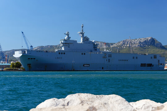 The amphibious assault helicopter carrier Mistral docked in the French Navy base at the harbor of Toulon, France.