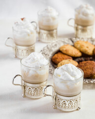 Cocoa with whipped cream and cookies on Christmas morning