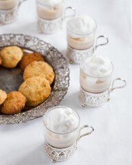 Cocoa with whipped cream and cookies on Christmas morning