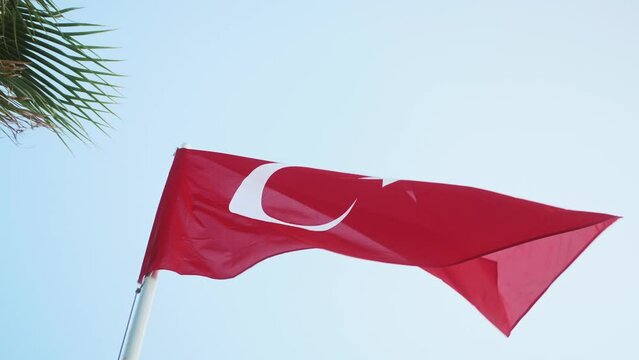 Turkish flag in Istanbul waving on clear sky background