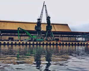 Port of Gdansk, Poland. Industrial landscape with cranes. Processed with VSCO with a5 preset. - 527657569