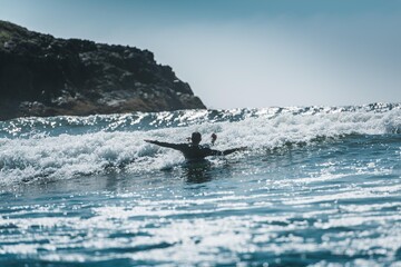 Surfing in the ocean