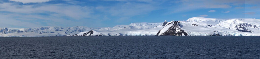 Panorama of snow covered mountains at Portal Point in Antarctica