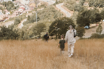 Children and women walking in the nature