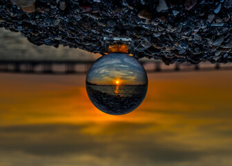 Sun Set reflection crystal ball ocean springs