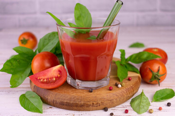 A glass of tomato juice with spices. Close-up.
