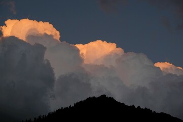 Close up of dramatic view of clouds lit by evening sunlight