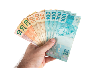 Hand holding Brazilian money banknotes. Brazilian finance concept